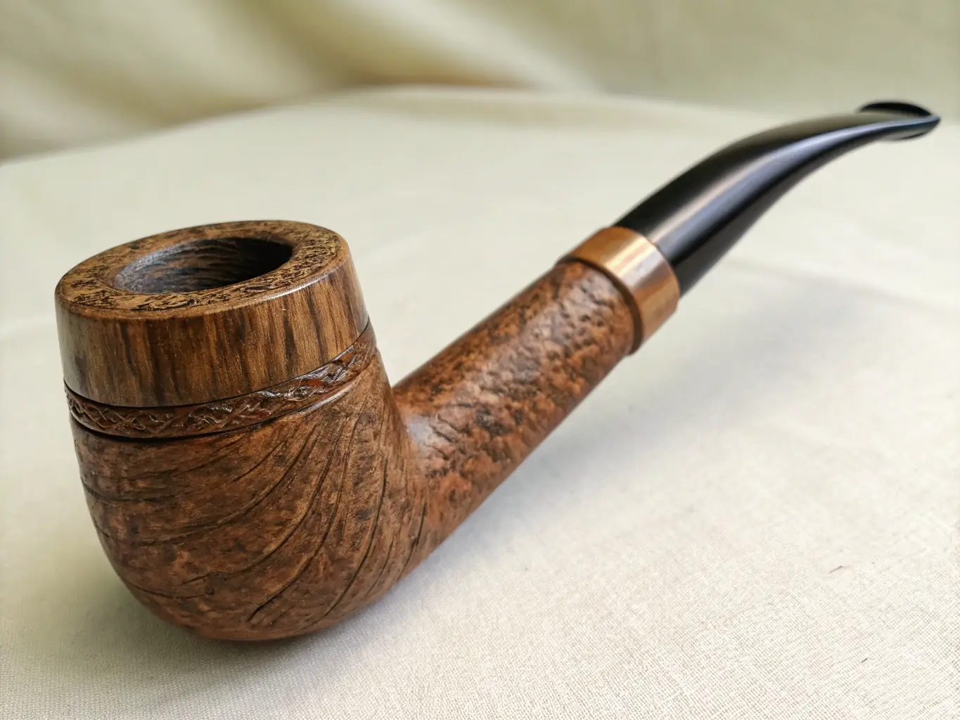 A close-up shot of an antique organ, showcasing its intricate details and craftsmanship. The image highlights the organ's pipes, keys, and ornate carvings, emphasizing its historical and artistic value.